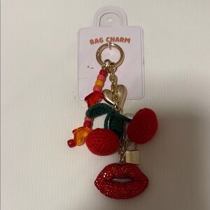 Anthropologie Green and Gold Bag Charm